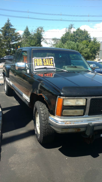 black pick-up truck 4 wheel drive
