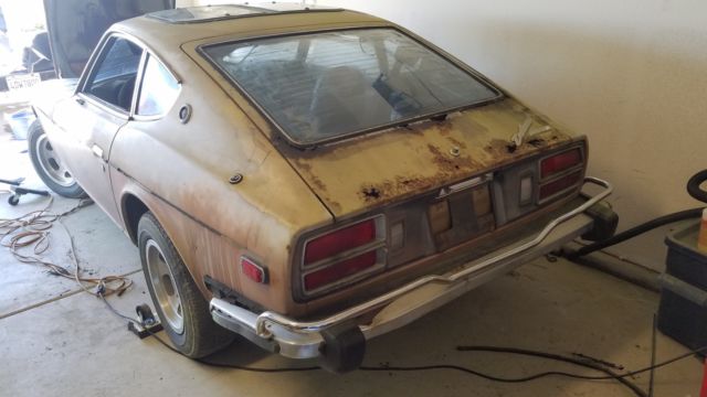 datsun (early 1974) 260z lhd w/ a/c, 4-speed, sun roof - backyard find