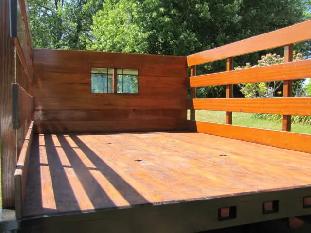 ford f350 1974 flatbed with mahogany head board & removable rails