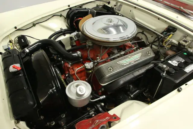 312 v8, 3 speed manual, power steering, wire wheels, prof. respray, super clean!