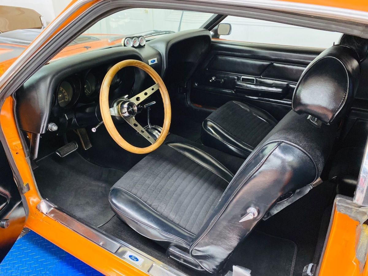 orange ford mustang with 11,660 miles available now!
