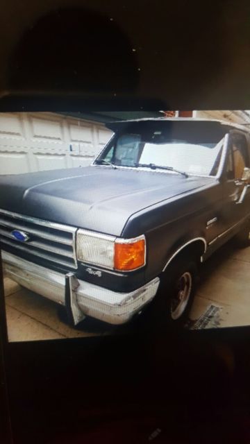 89 ford bronco 6 cyl automatic 83 k flat black/red interrior runs great