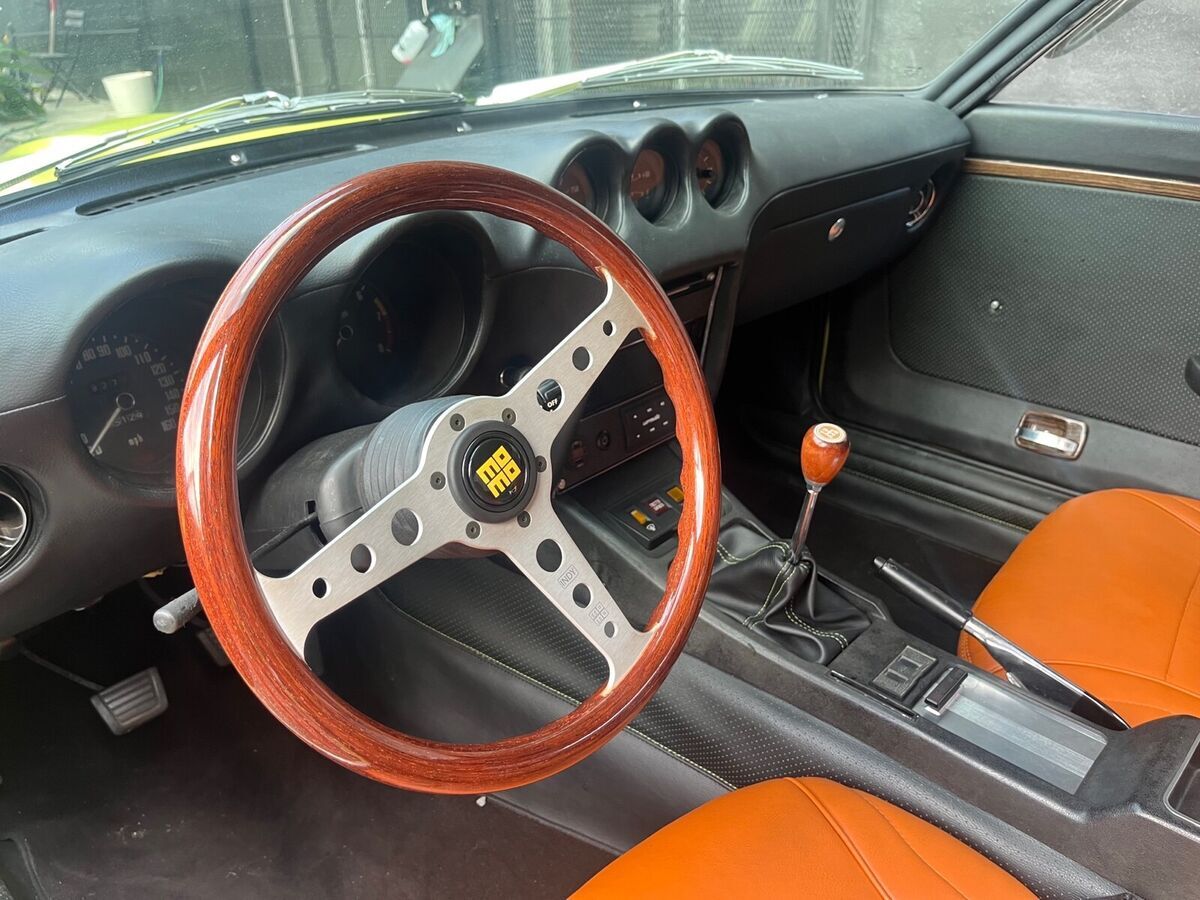 1973 datsun 240z coupe yellow rwd manual