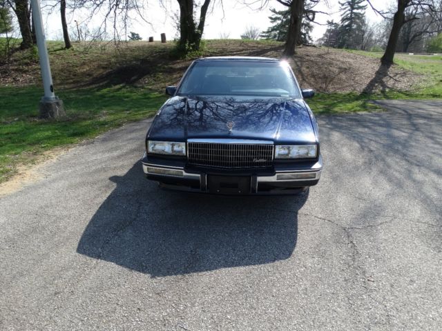 90' seville...68k miles...2 owner..always serviced @ cadillac...no reserve