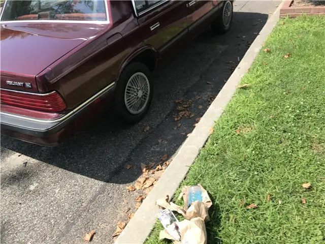 1988 plymouth reliant america 36,989 miles maroon 4 door 4 cylinder engine 2.2l/