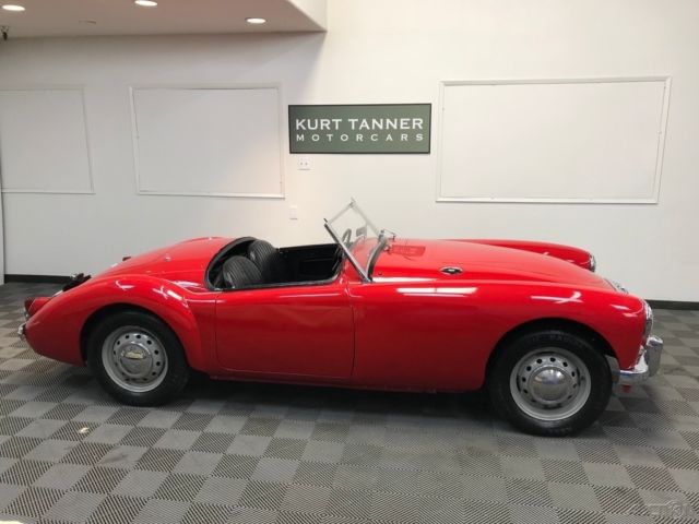 1957 mga 1500 roadster. older restoration still driving and showing well