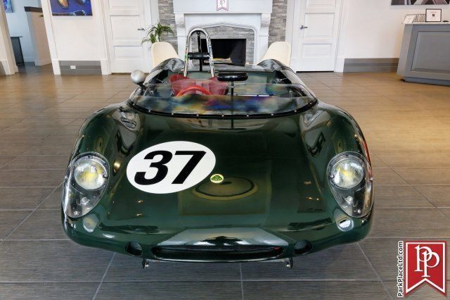 1962 lotus 23, british racing green, red buckets, vintage racing car