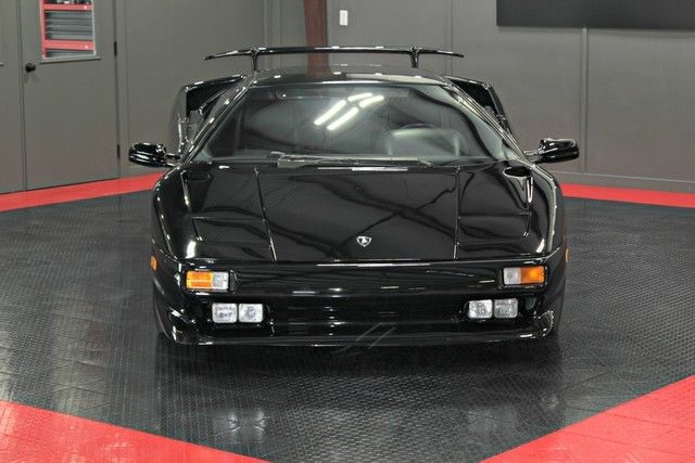 factory wing, brembo brakes, upgraded lambo wheels