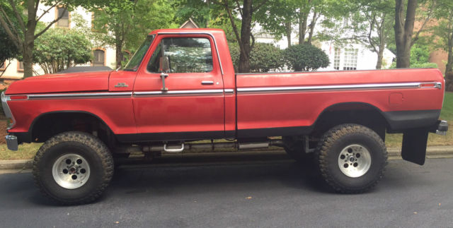 classic truck, ford f150 red 4x4 lifted with bfg offroad tires red