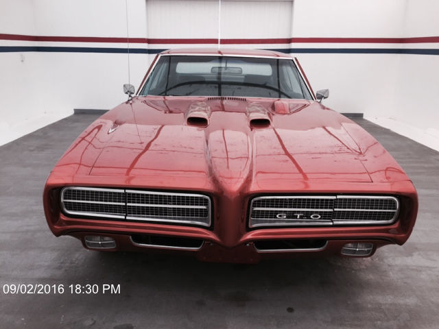 1969 pontiac gto coupe, orange, good condition, low miles