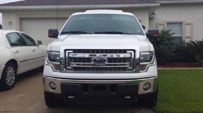2014 ford f150 xlt, supercrew cab, 4x4, with leer topper in yulee, fl
