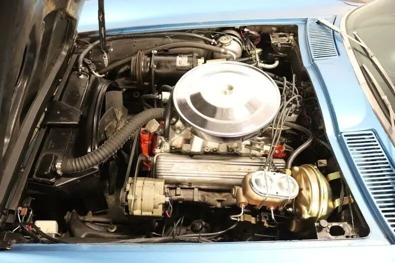 clean survivor w/ era correct 327 v8, 4 spd man, factory a/c, original paint!