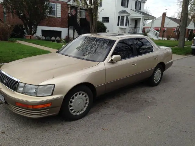 4 door sedan tan automatic fwd v8 gold tan 8 cyl 92