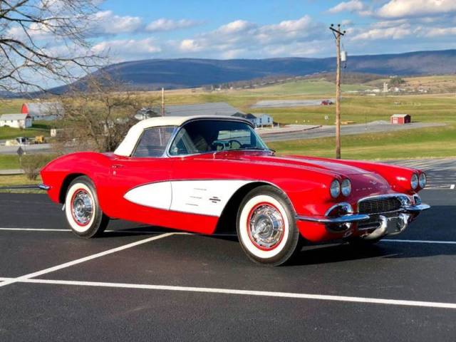 1961 corvette convertible *romanred/black*n.o.m dual quad conv*4spd*bodyonresto