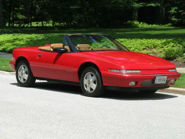 one-owner, 49,600 original miles, bright red, saddle leather, window sticker wow