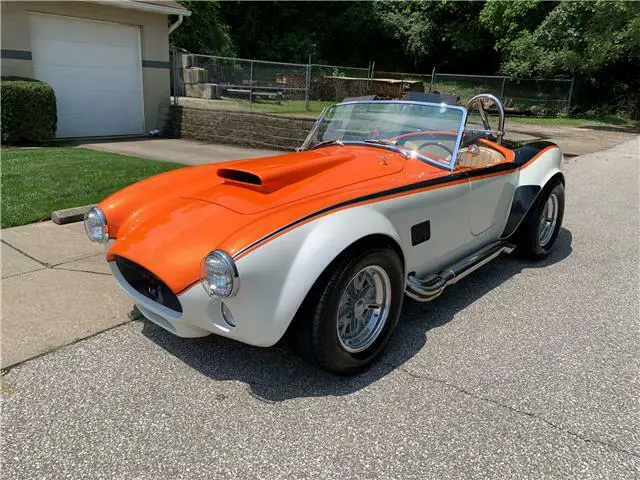 1967 shelby cobra replica roadster 11,499 miles orange, black, and white 2dr roa