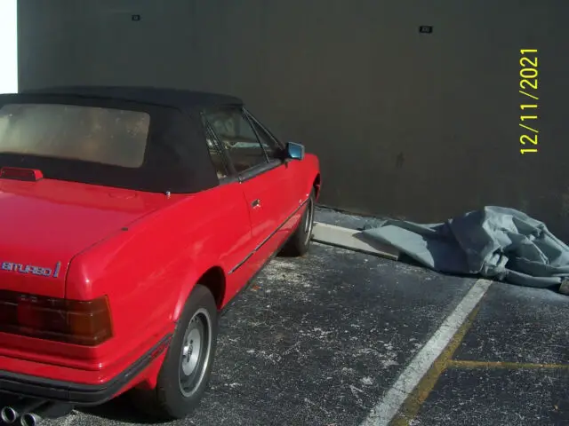 1987 red maserati spyder