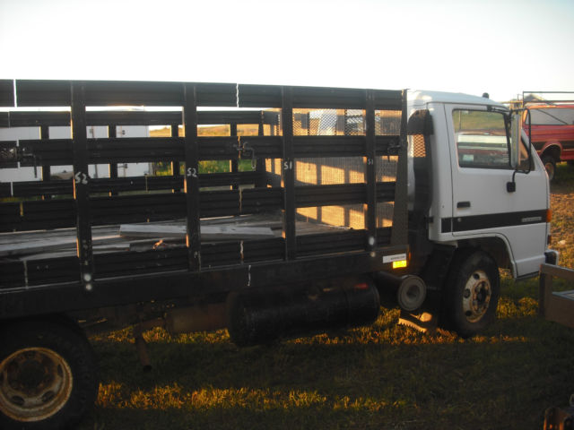 isuzu npr diesel 1990 flatbed with removable sides