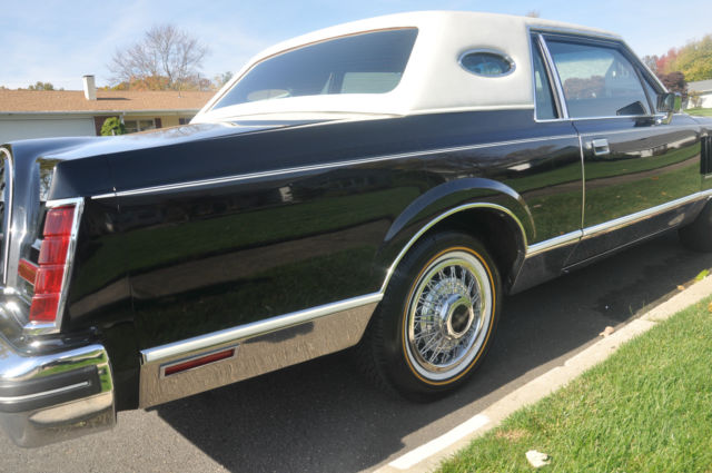 mint condition 2door mark vi. black with white full vinyl roof