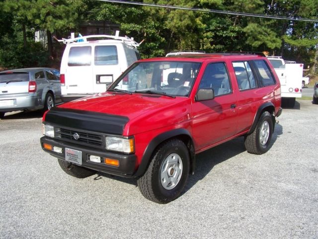 an all stk 4wd new 31-10s bright red 4 wheel disc quality very neat hardbody suv