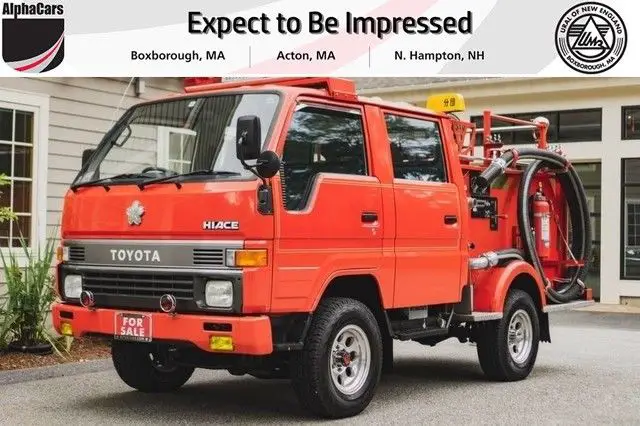 red toyota hiace at alphacars of acton