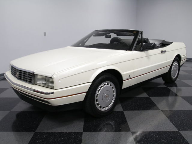 well preserved, fresh built 4.5l v8, pwr everything, a/c, leather, nice drop top