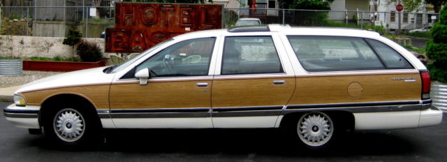 1992 wagon,white w/blue leather,astro roof,5.7lv-8,ac,dyna-glidesusp,auto,ps,pdb