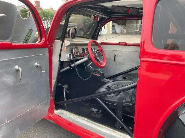 red/ black ford anglia available now!
