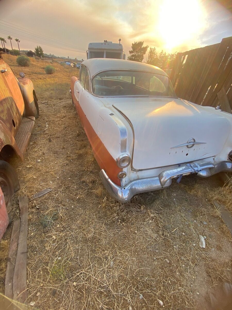 1955 pontiac chieftain coupe red hardtop
