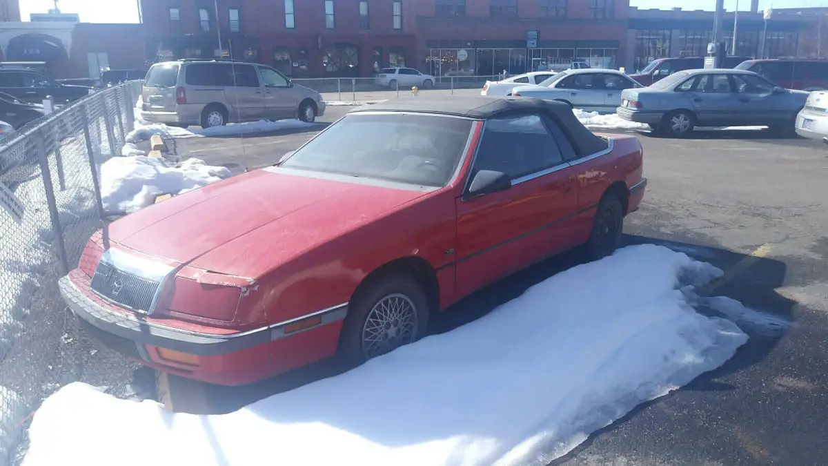 cherry red convertible coupe 3.0 liter v6 turbo engine.. low miles