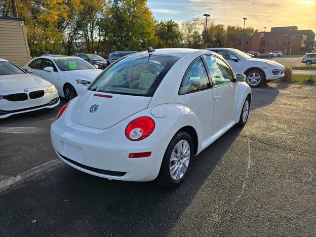 2010 volkswagen new beetle base pzev 2dr coupe 6a