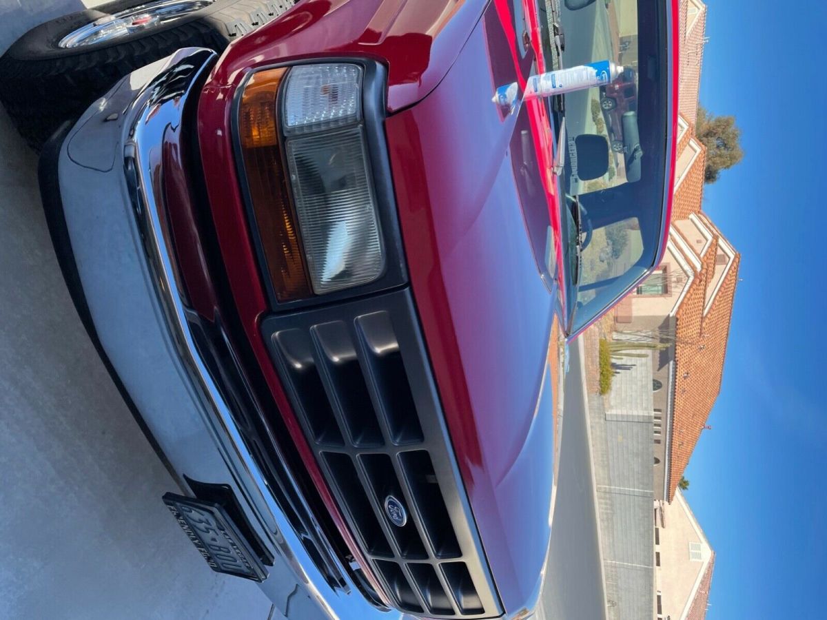 short bed 1993 red ford xl f150. v8 302 motor 4 wheel manual