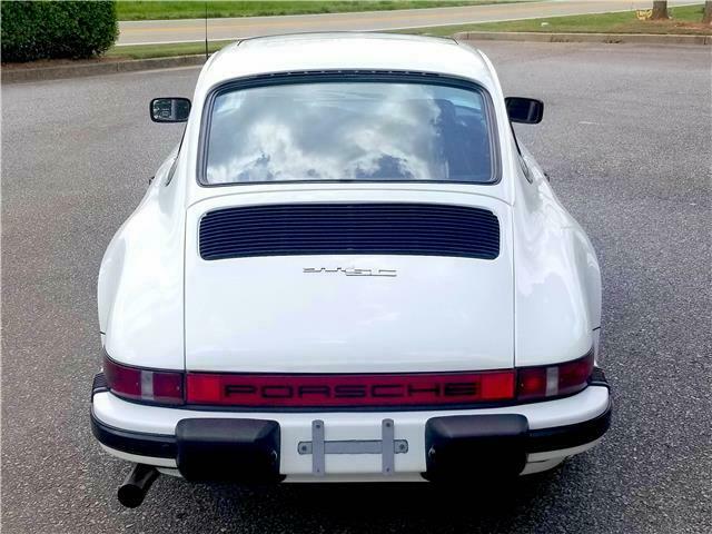 1980 porsche 911 sc grand prix white on blue