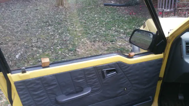 1991 geo tracker convertible - yellow w/ gray interior