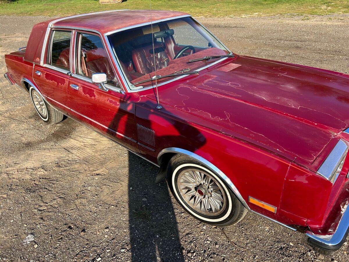 1985 chrysler fifth avenue sedan red rwd automatic