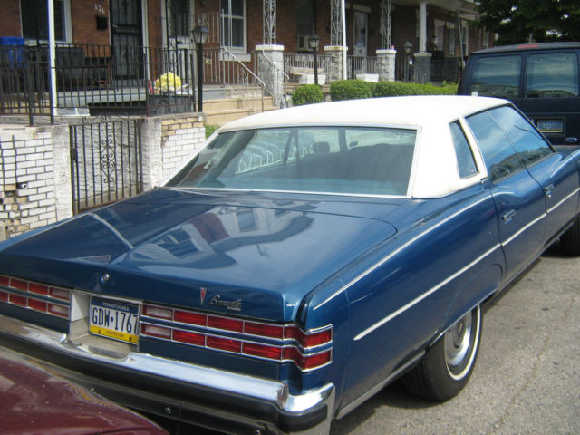 1976 4- dr hard top , blue, very good condition, garage kept, white vinyl top