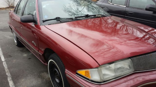 1994 buick skylark custom 4 cyl. 119,000 miles~remote starter~burgundy red