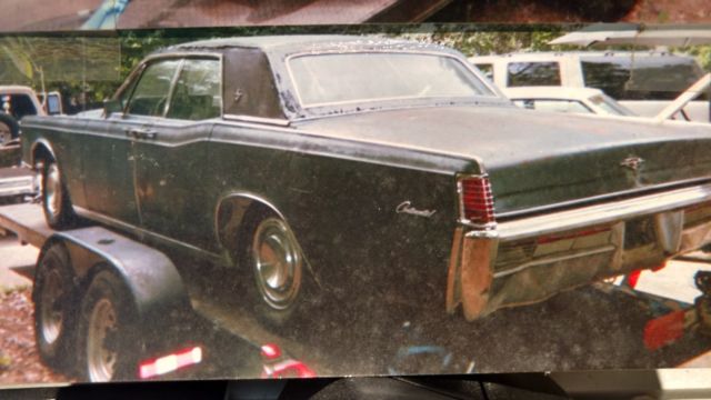 1966 lincoln, suicide doors