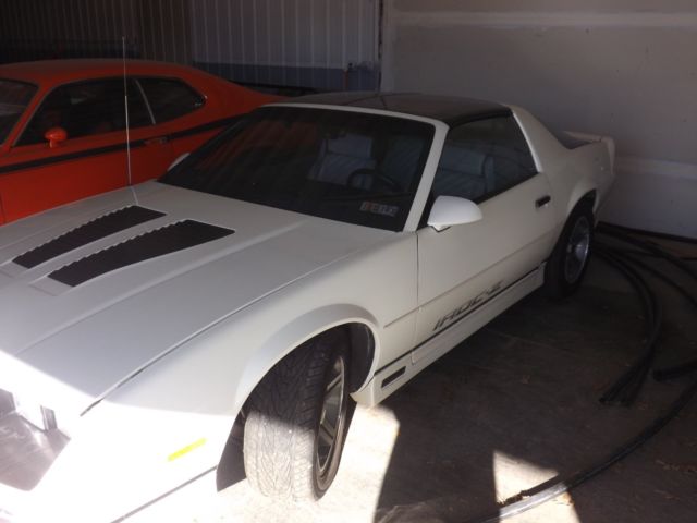 1987 chevy iroc with 11,000 miles this car is fully loaded always kept inside i