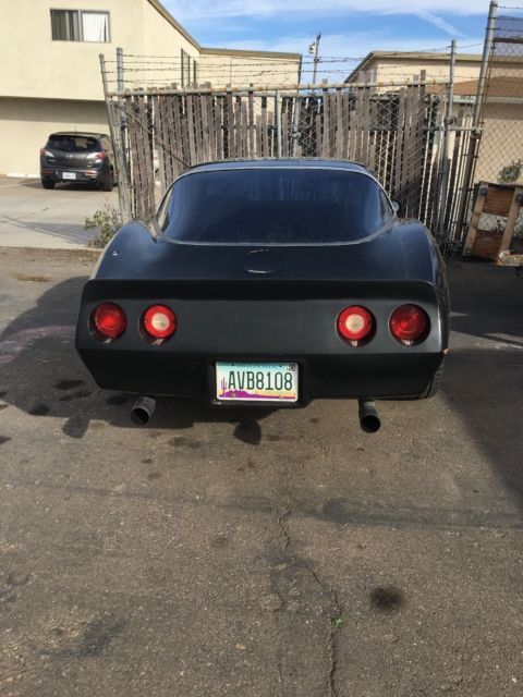 1982 black corvette with black interior
