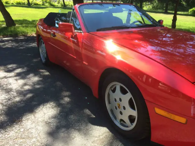 red with black convertible top, low low mileage
