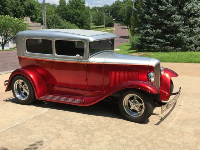 1930 ford hotrod 350 chevy with mild cam and 4 bbl. auto trans., nice redone int
