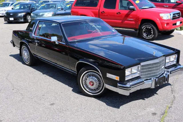 1985 cadillac eldorado for sale~black on red~4.1l v8~low miles~beautiful caddie!