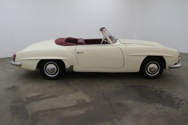 ivory with black canvas soft top presentable car that is mechanically sound