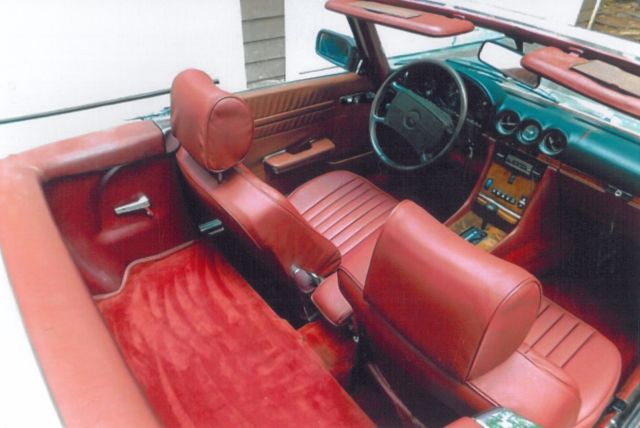 silver 1986 mercedes 560 sl