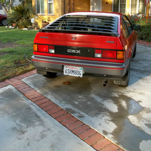 1985 honda crx red very low mileage 68,500 very clean with a/c