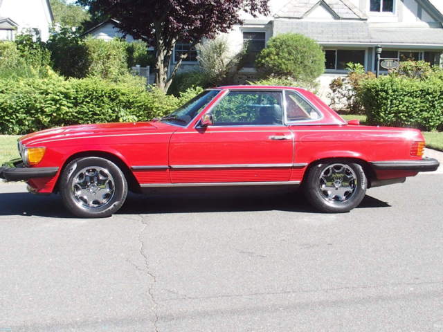 no reserve stunning red 560 sl new soft top only 65,000 miles