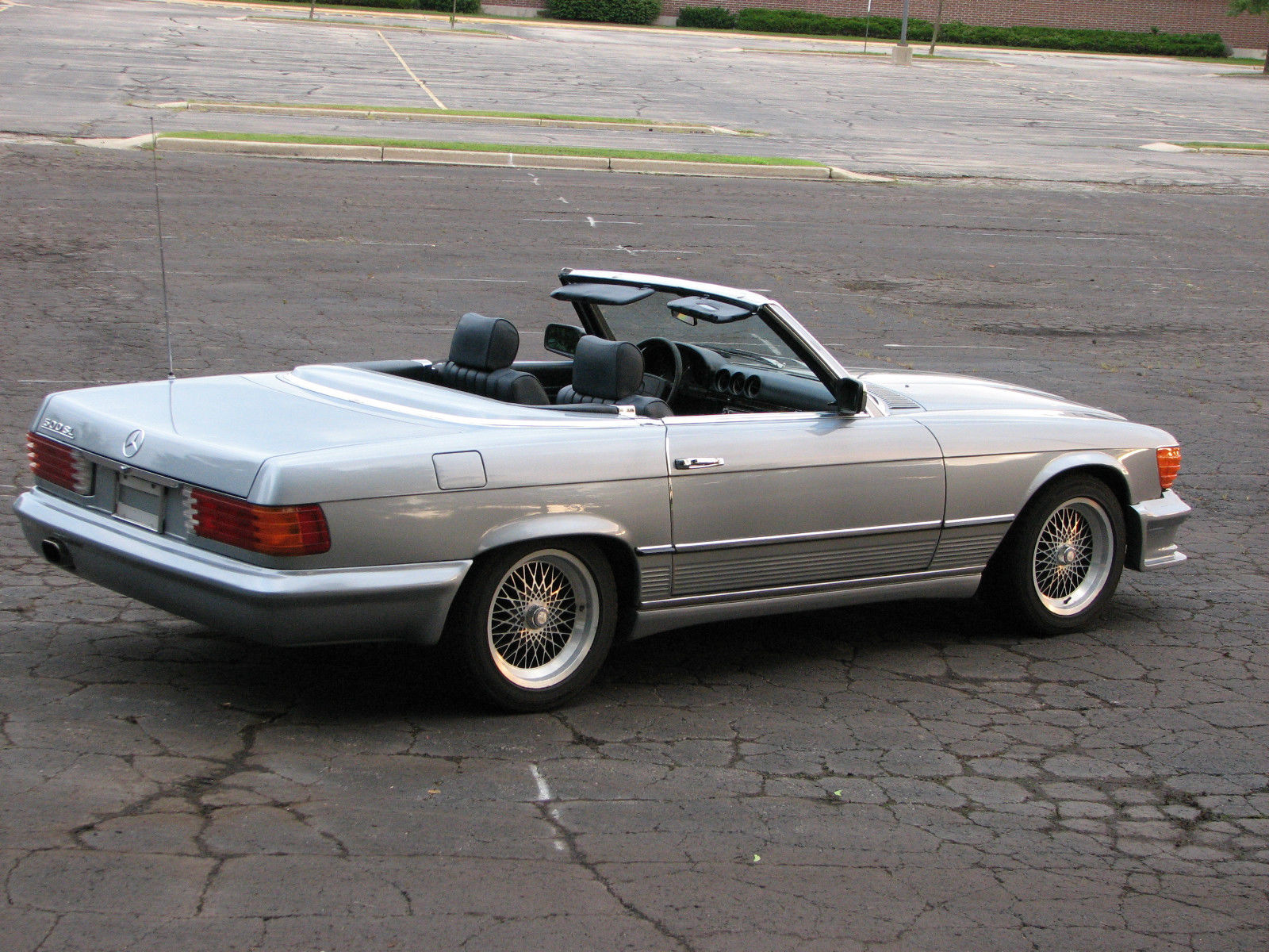 84 benz^500sl^2+2 convertible^two tops^ kinder seat^many updates^v.rare^like new