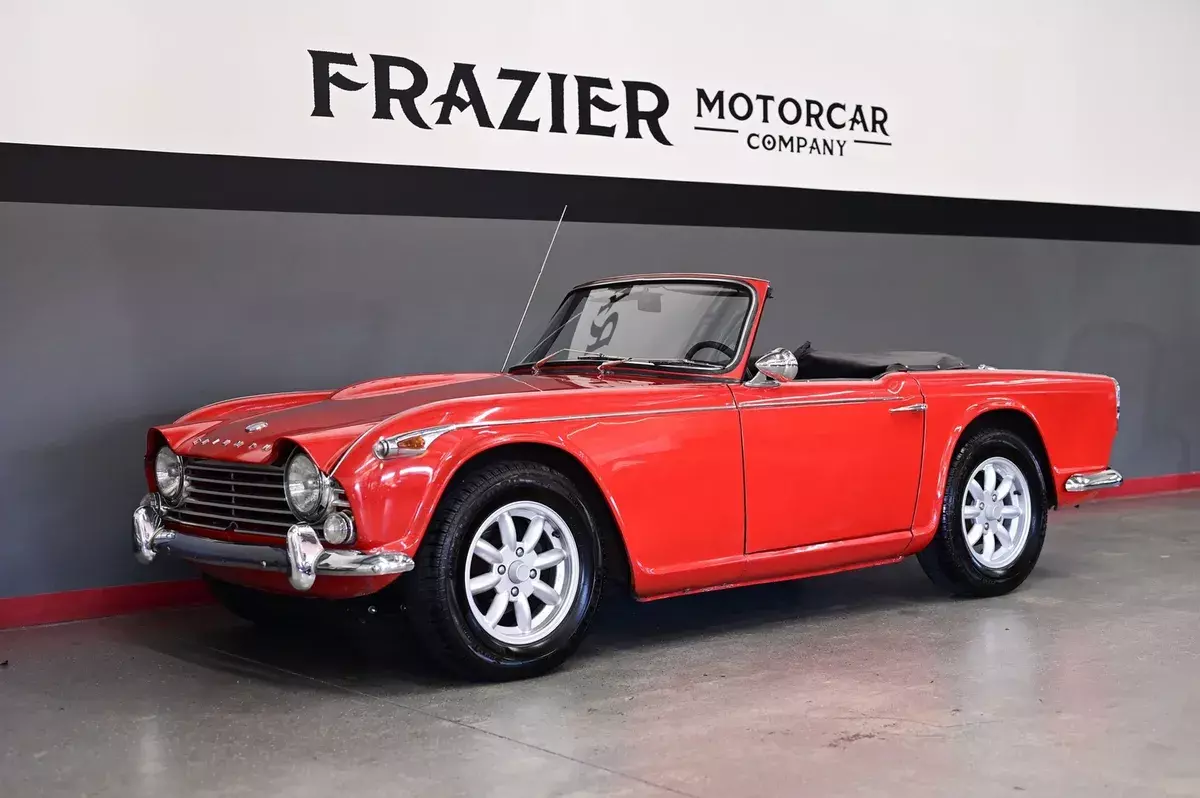 strong,solid,handsome triumph tr4 with great run and drive red over black