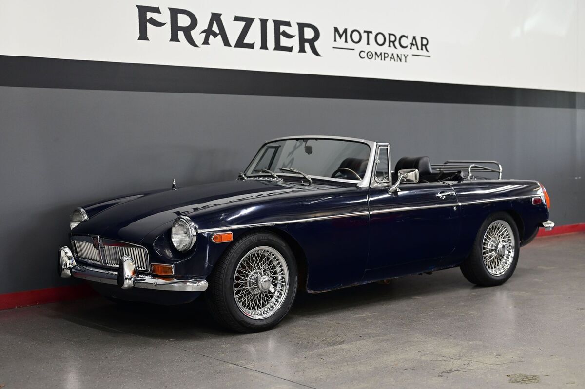 attractive ,nice driving entry level mgb roadster blue/black chrome wires